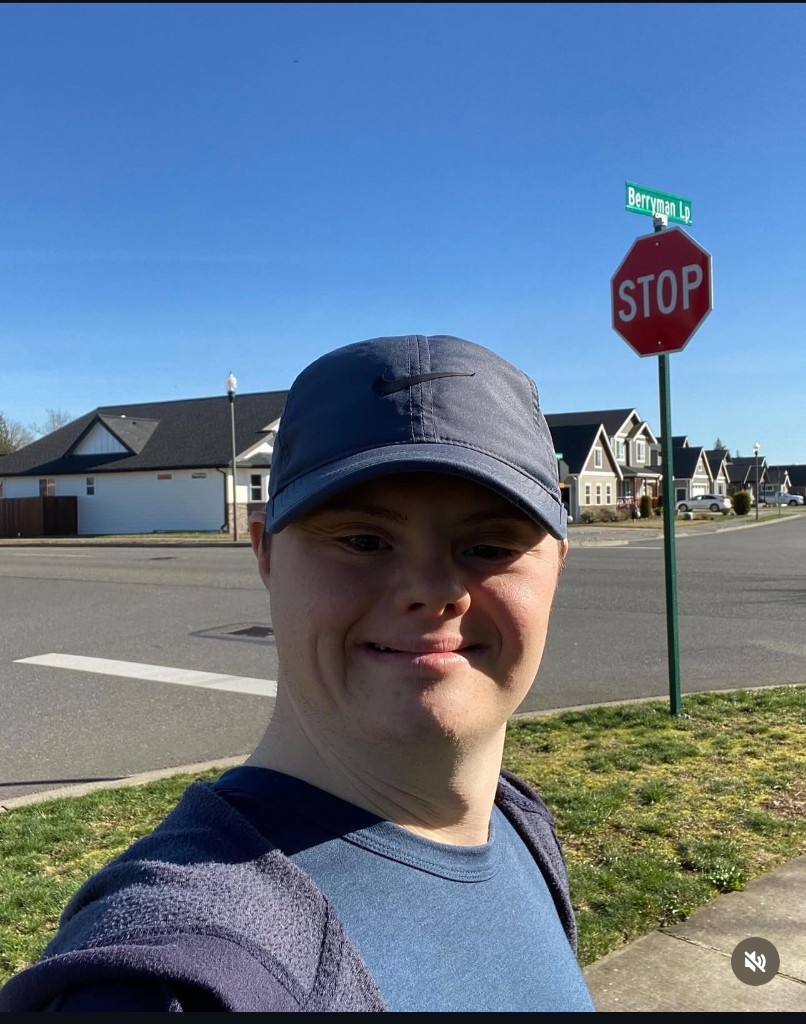 Nikita outdoors smiling